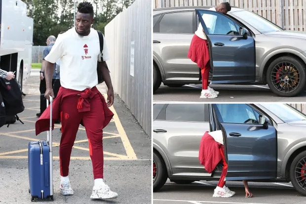 Onana đánh rơi chìa khóa trước cánh săn ảnh khi MU trở về sau trận thua Bayern Munich. (Ảnh: The Sun)