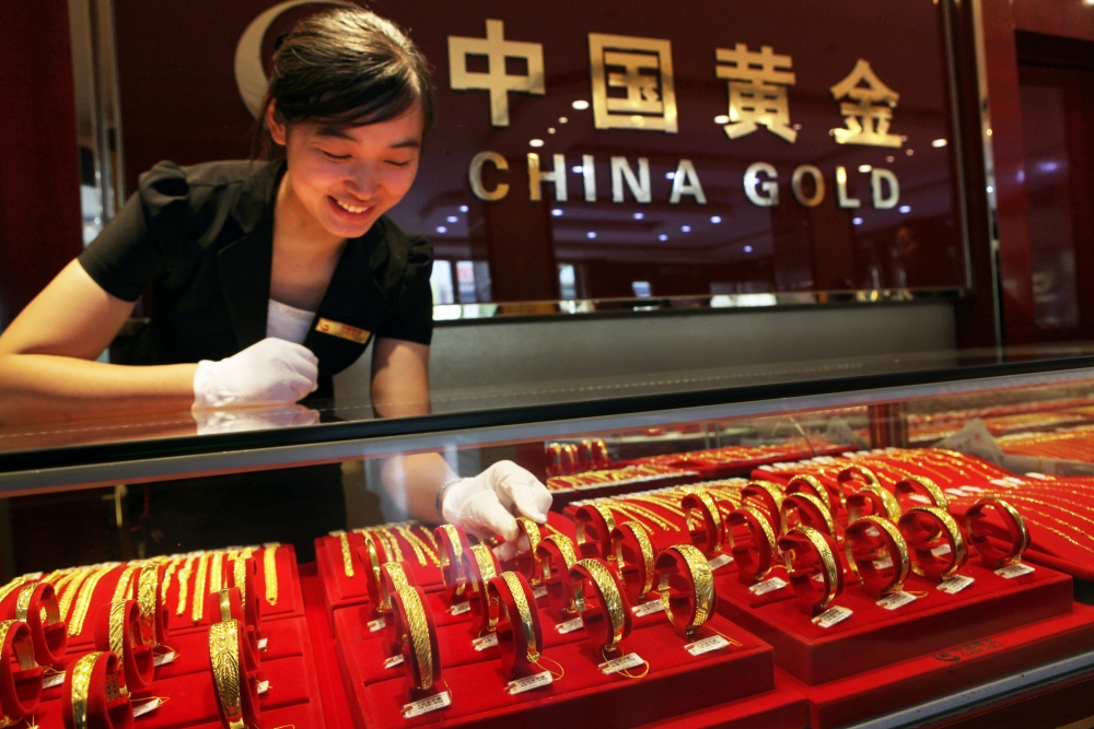 Giá vàng tại Trung Quốc tăng mạnh do chiến sự ở Trung Đông (Ảnh: Chinadaily)