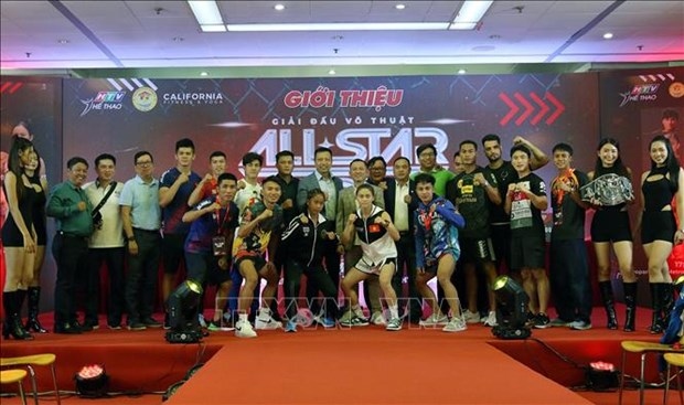 Martial arts competitors and participants at the ceremony on October 13.