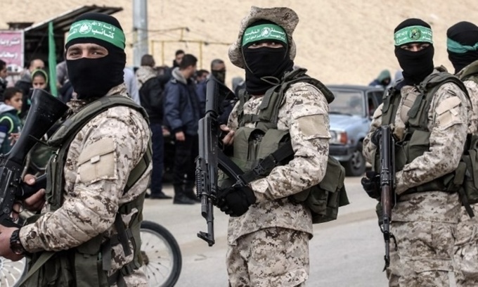 Các chiến binh Hamas tham dự một buổi lễ tưởng niệm tại thị trấn Rafah, phía nam Dải Gaza. Ảnh: AFP