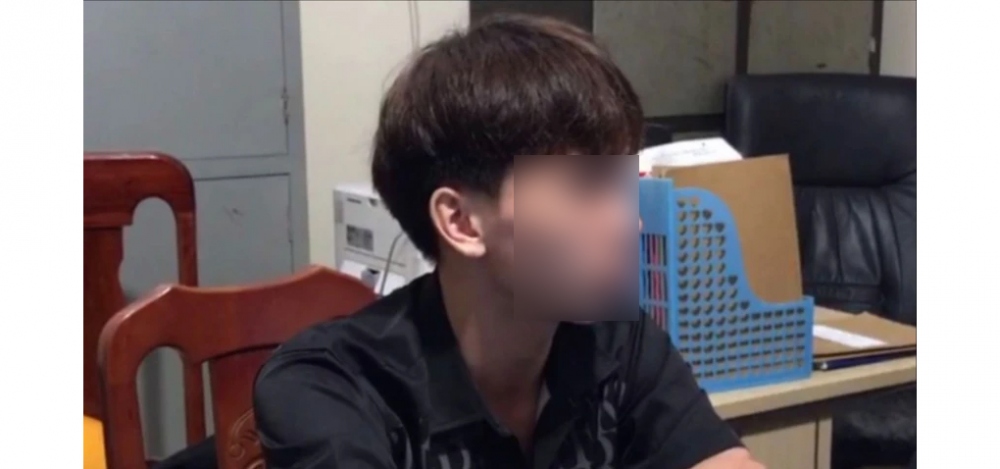 Lê Hữu Đạt tại cơ quan công an