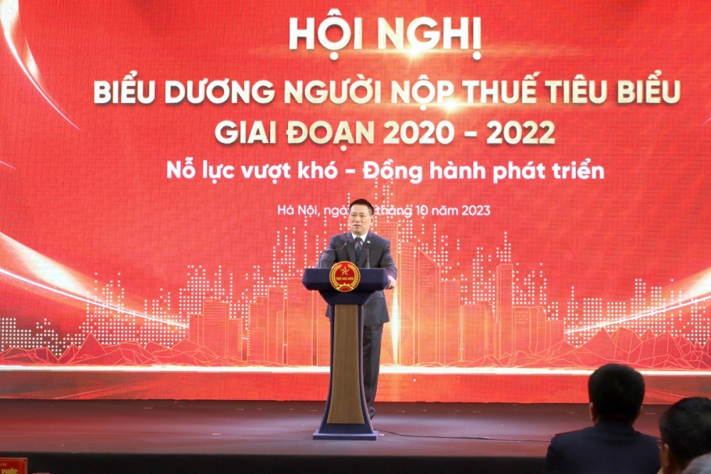 Bộ trưởng Bộ Tài chính Hồ Đức Phớc phát biểu tại Hội nghị.