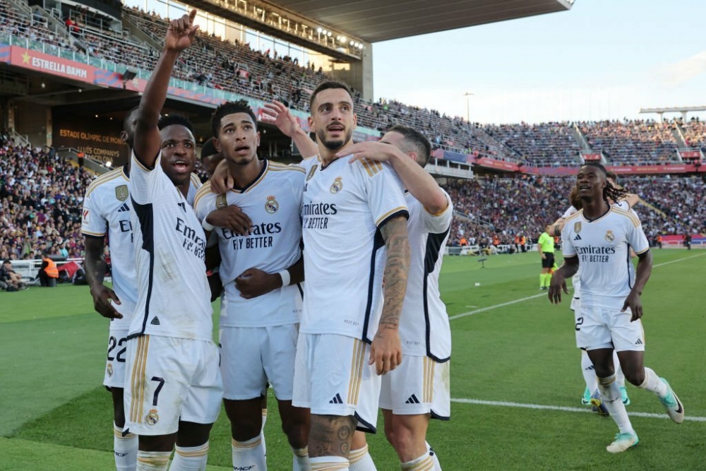 Chiến thắng này giúp Real Madrid đòi lại ngôi đầu bảng khi có cùng 28 điểm như Girona nhưng hơn chỉ số phụ. (Ảnh: Getty)