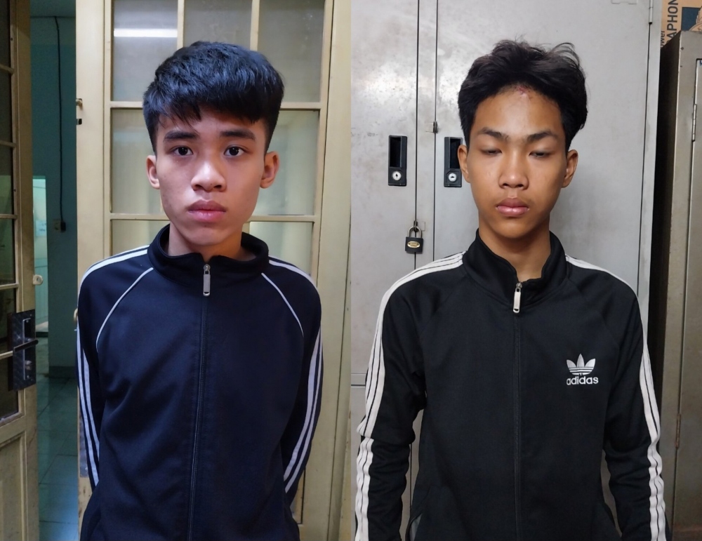 Trần Đức Hoàng Quân và Lê Anh Kiệt tại cơ quan công an. (Ảnh: N.H)