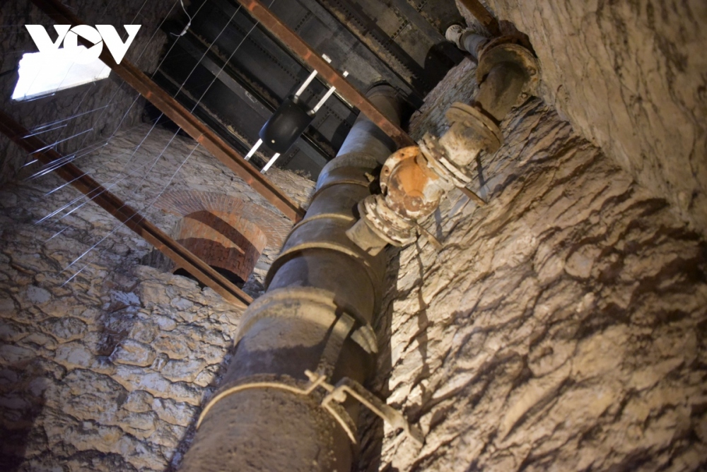 The piping system has iron valves which are still intact and covered with dust.