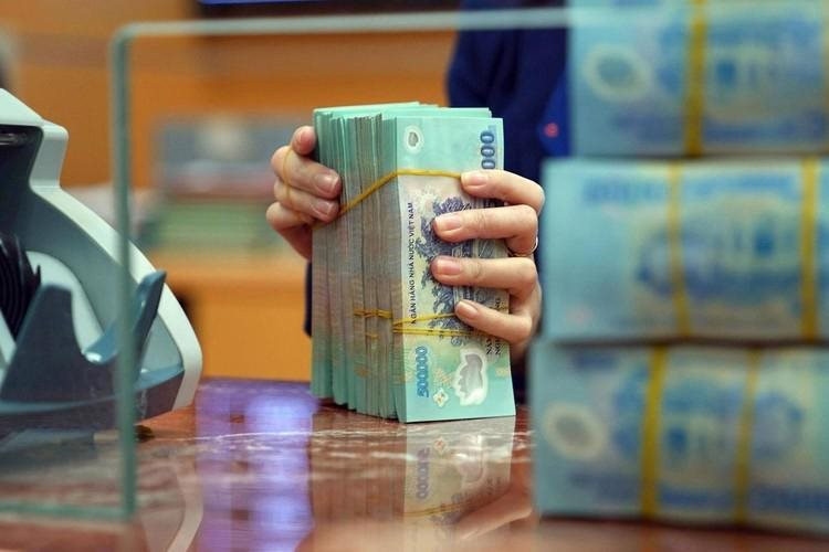 Lãi suất tiền gửi ngân hàng tiếp tục hạ xuống mức thấp kỷ lục. (Ảnh minh họa: KT)