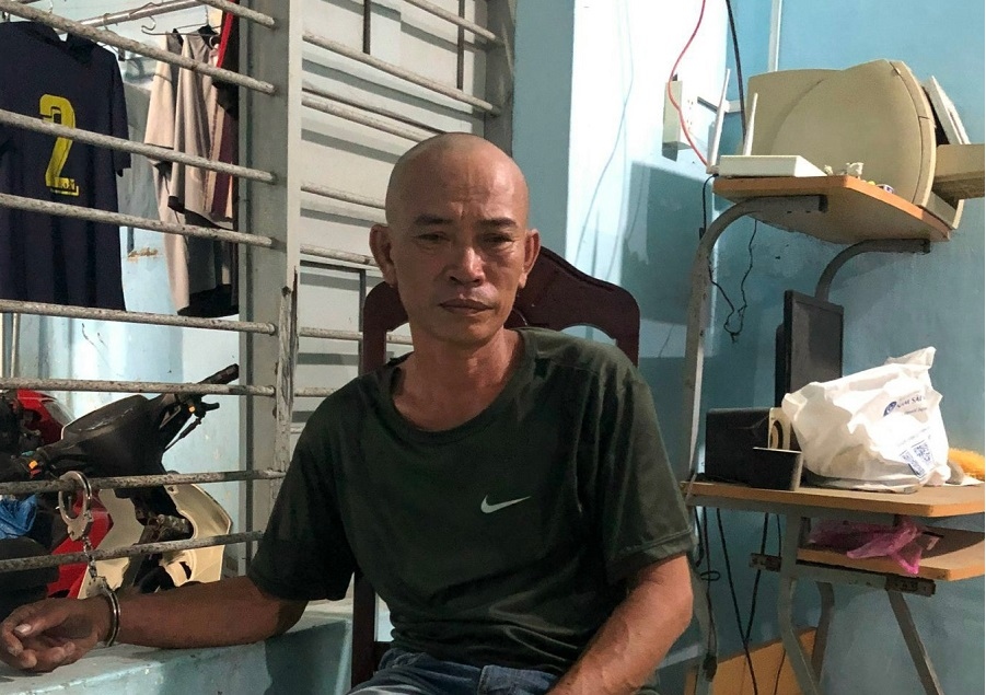 Đối tượng Lê Hải tại cơ quan công an. Ảnh: CACC