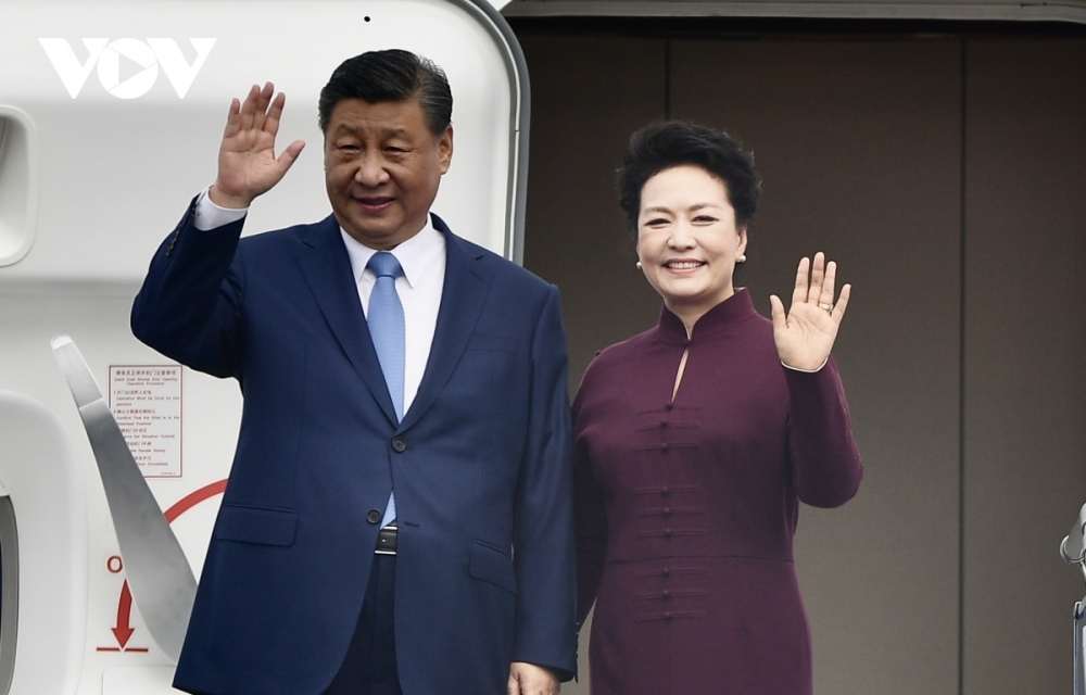 Party General Secretary and President Xi Jinping and his wife arrive at Noi Bai International Airport in Hanoi on December 12, beginning a two-day State visit to Vietnam.