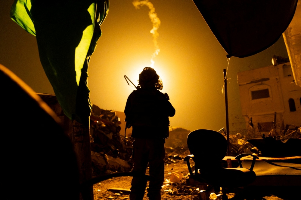 Binh lính Israel chiến đấu ở dải Gaza. Ảnh: Reuters