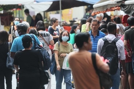 Các hoạt động du lịch cuối năm cũng là nguyên nhân khiến số ca COVID-19 tăng cao tại Singapore (Ảnh: Strait Times)