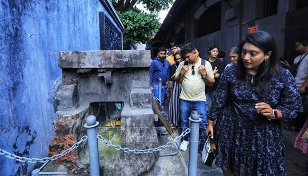 Foreign visitors to Hoa Lo Prison, a relic site in Hanoi.