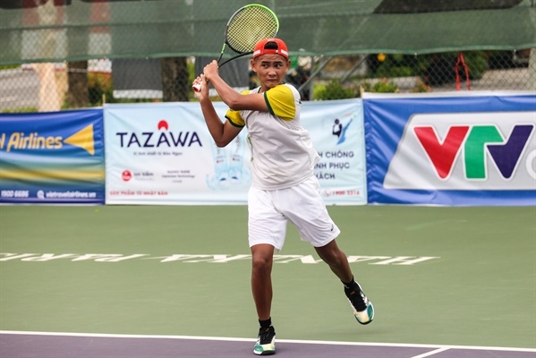 Vietnamese athlete Vo Tuan Dat compete in Asia U14 tennis champs in 2022 (Photo: baovanhoa.vn)