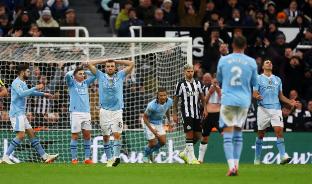 Sự tiếc nuối của các cầu thủ Man City. (Ảnh: Reuters)