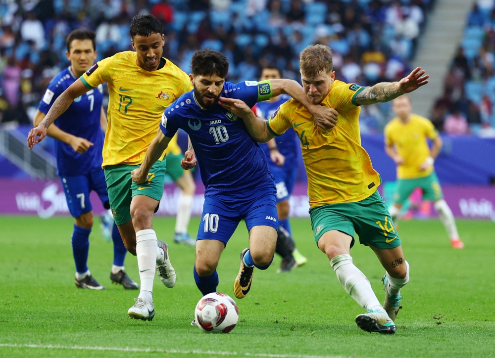 ĐT Australia hoà ĐT Uzbekistan 1-1. (Ảnh: Reuters)