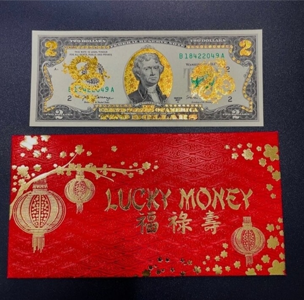 Tờ 2 USD mạ vàng. (Ảnh: Muabantien)