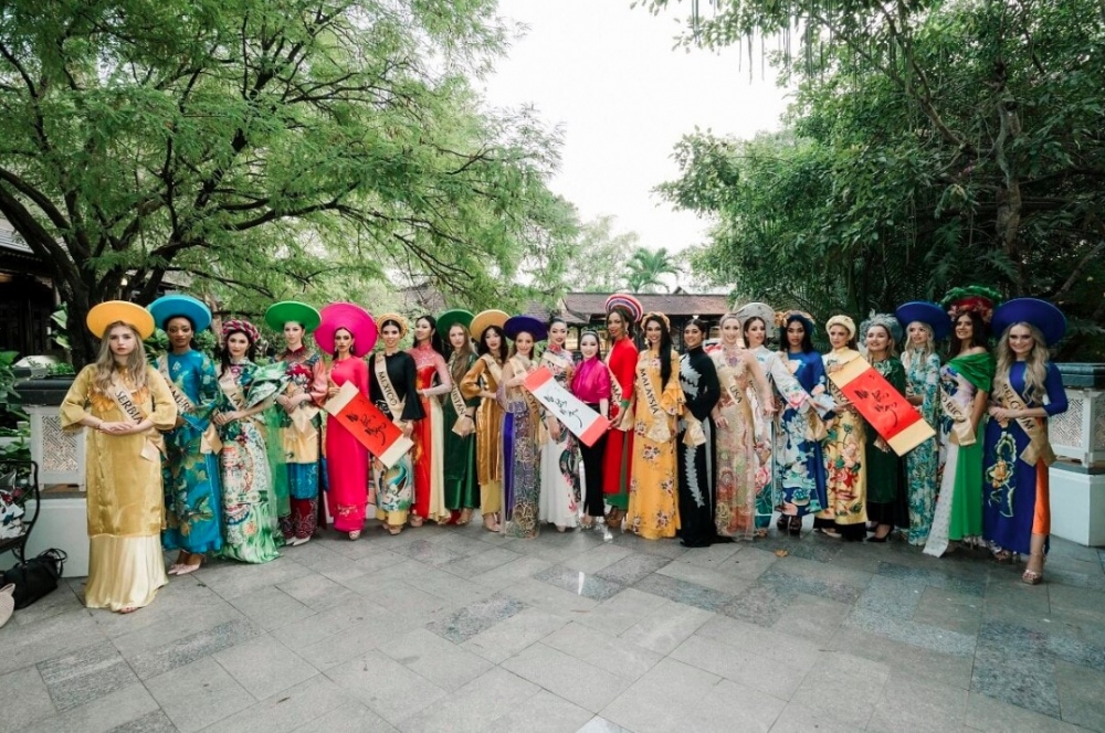 Vietnamese designer Chau Loan prepares a total of 83 Ao Dai which draw inspiration from images of traditional culture such as the carp and the dragon.
