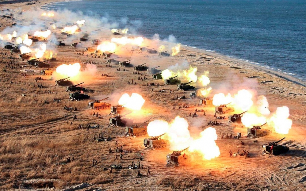 Pháo binh Triều Tiên nhả đạn. Ảnh: KCNA.