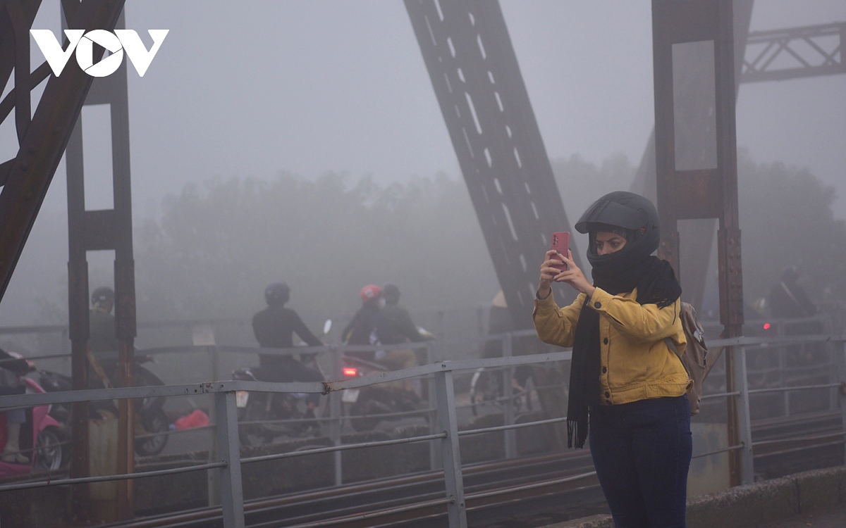 Ho Guom (Returned Sword Lake), a historical landmark in Hanoi, is covered in a thick blanket of fog.