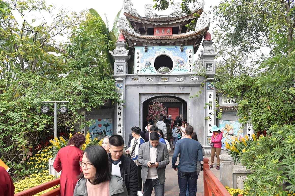 . Ngoc Son Temple is also packed with people on the first day of Tet.
