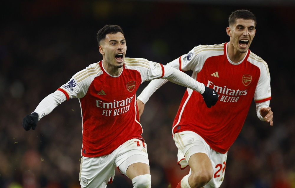 Arsenal tái lập thế dẫn bàn trước Liverpool. (Ảnh: Reuters)