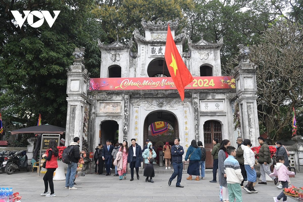 Hanoians head towards Quan Thanh Temple.