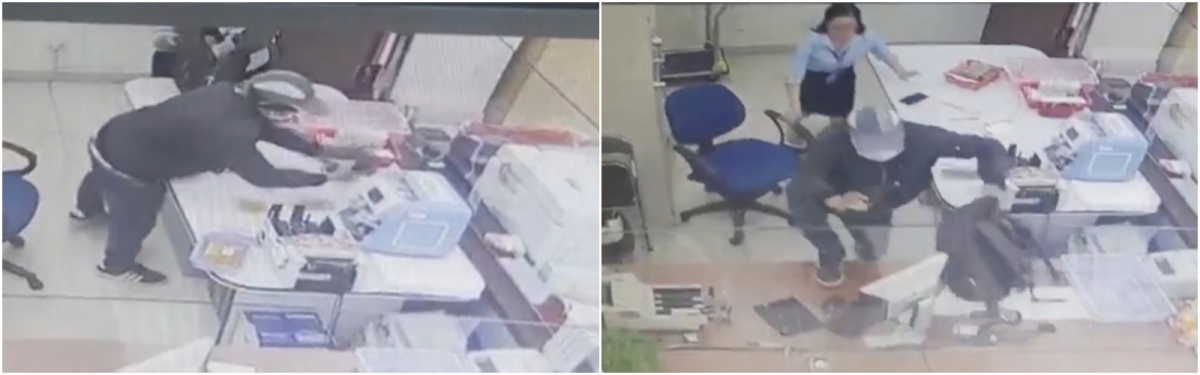 Nghi phạm gây ra vụ cướp nhảy vào bên trong quầy lấy các cọc tiền cho vào balo, sau đó nhảy ra ngoài và tẩu thoát