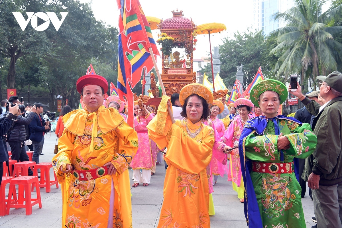 Diverse activities are held during the festival, including a procession featuring King Quang Trung’s palanquin.