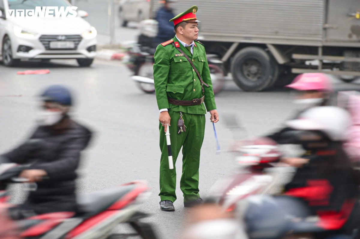Traffic policemen must be on duty for the whole day as the Lunar New Year, known locally as Tet, fast approaches.