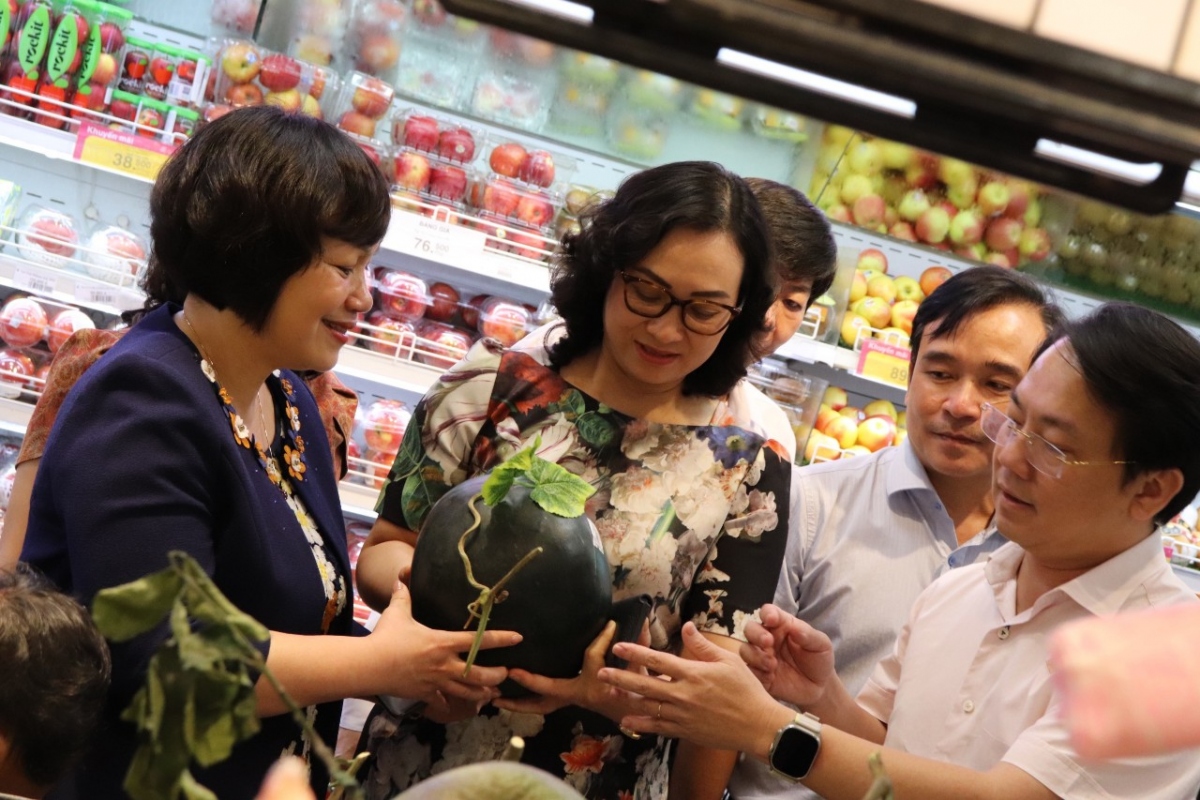 Ông Nguyễn Anh Đức - Tổng giám đốc Saigon Co.op báo cáo về tình hình kinh doanh Tết
