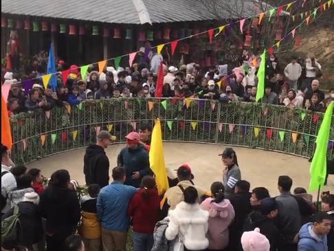Tourists show their excitement at taking part in the game.