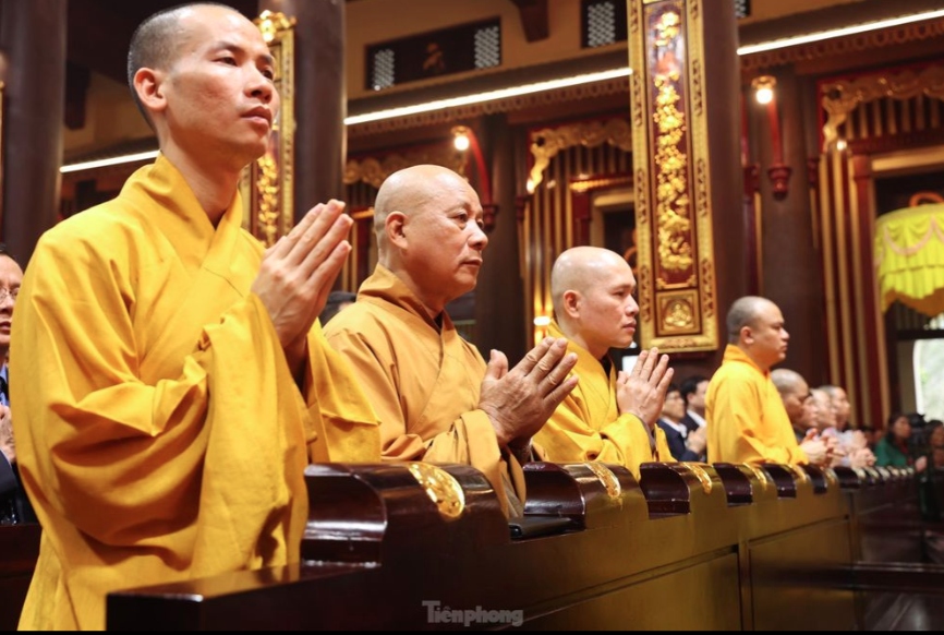 Participants come together to pray for peace during the opening ceremony of the festival.