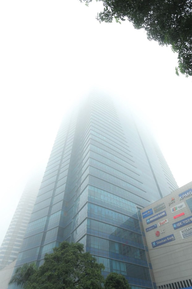 Fog covers Keangnam Hanoi Landmark Tower, the tallest building in Hanoi.