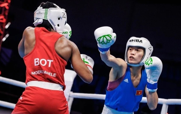 Vietnamese boxer Nguyen Thi Tam (R) is an experienced international fighter. (Photo: TTVN)