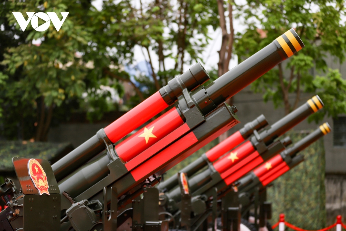 Part of the cannon barrel is painted with the Vietnamese national flag.