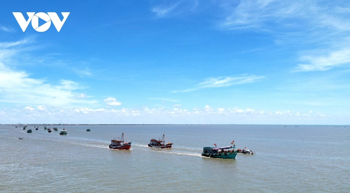 A total of 30 ships decorated with flags and flowers create a vibrant atmosphere during the procession.