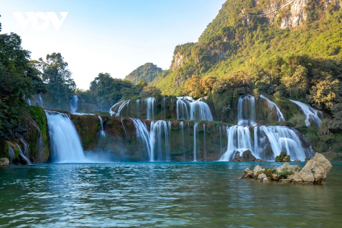 Straddling both nations, Ban Gioc waterfall astounds with its layered beauty with its cascades harmoniously blending amidst breathtaking surroundings.