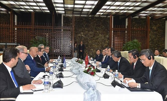 Phó Thủ tướng Trần Lưu Quang làm việc với đồng chí Bruno Rodriguez, Uỷ viên Bộ Chính trị, Bộ trưởng Ngoại giao Cuba. Ảnh: VGP/TTXVN
