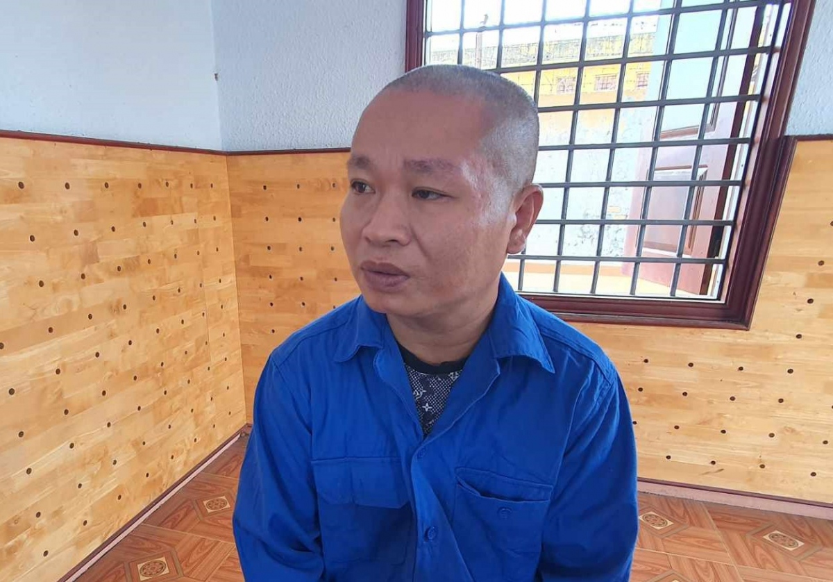 Vũ Quốc Sơn tại cơ quan công an.