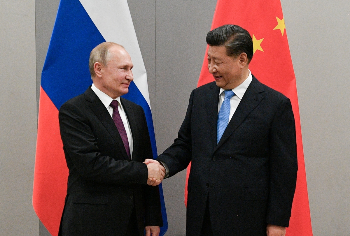 Tổng thống Nga Vladimir Putin và Chủ tịch Trung Quốc Tập Cận Bình. Ảnh: Reuters