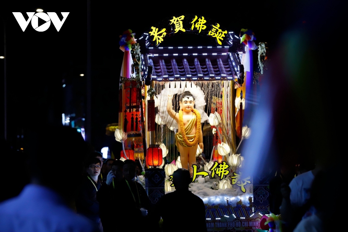 Paper lanterns are carried in the parade.