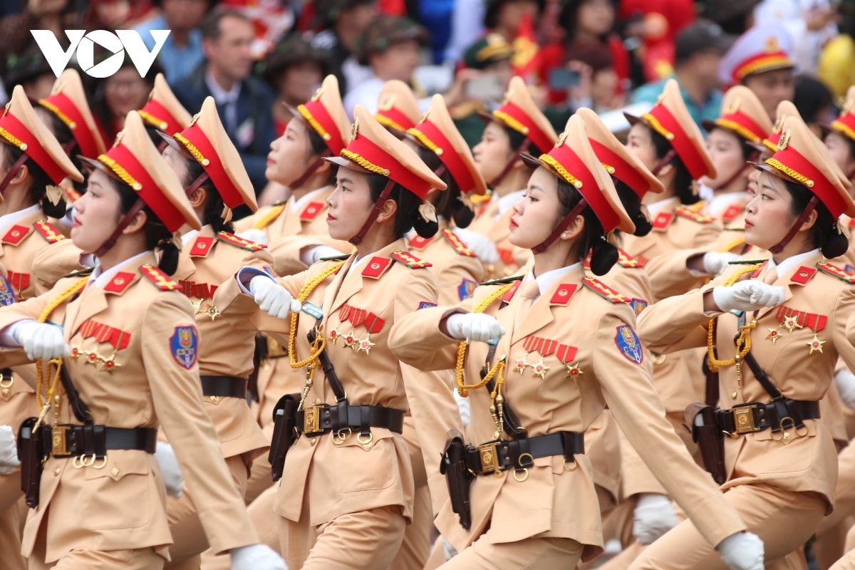 Traffic policemen enter the stage area.