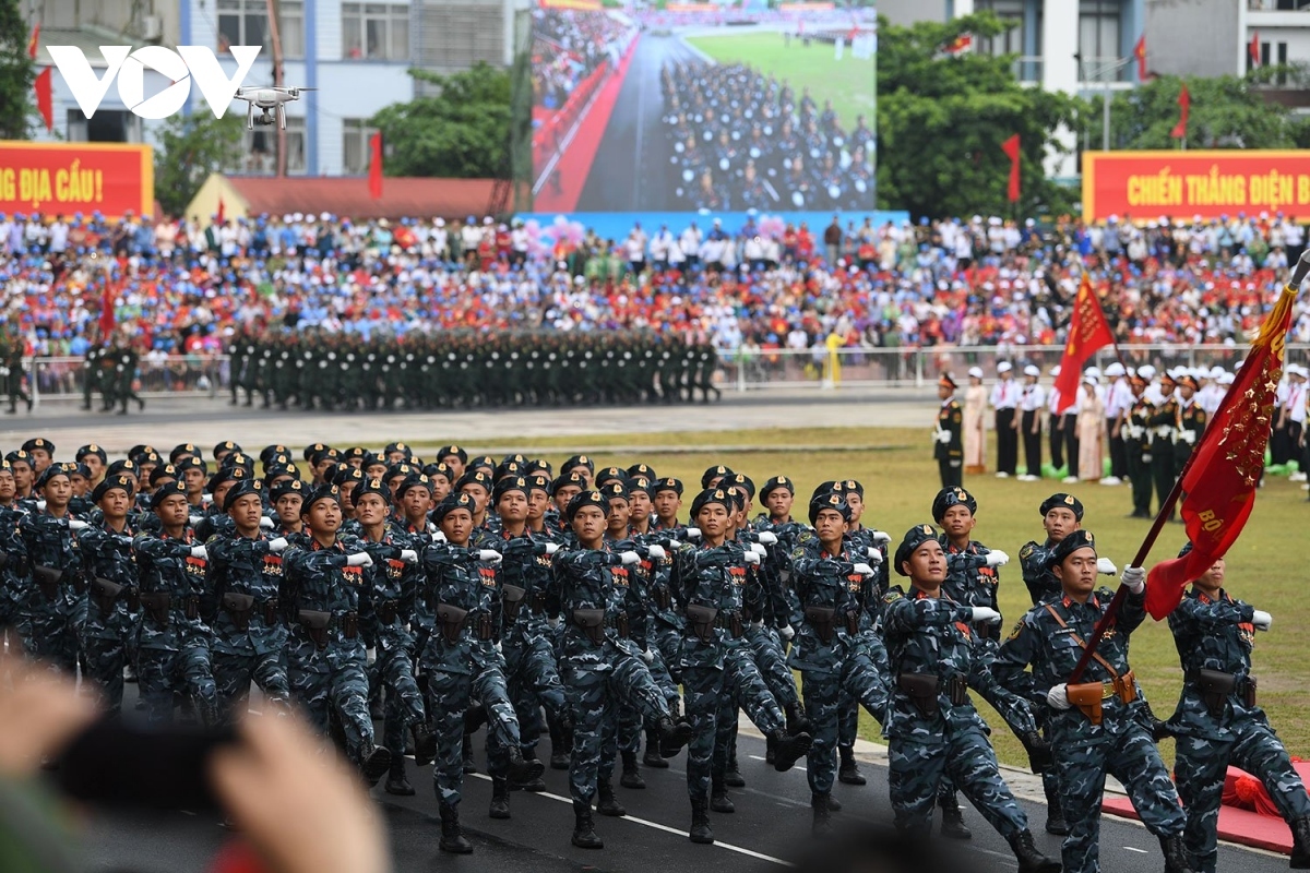 A parade of soldiers in charge of cyberspace warfare operations appear at the event.
