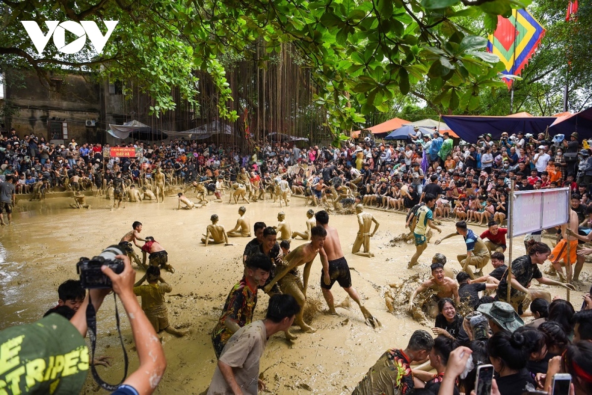 The winners share their happiness alongside local villagers.