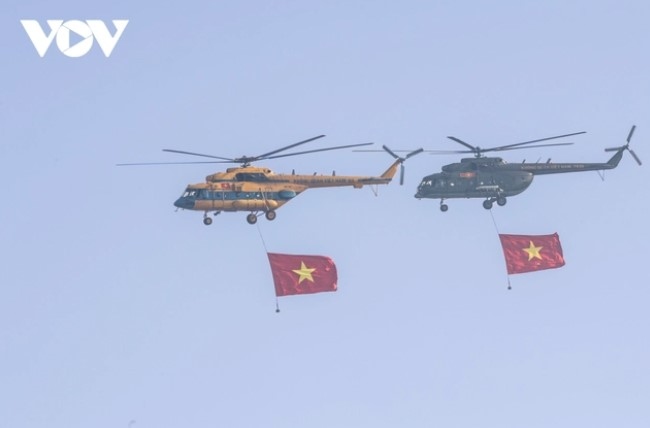 Armed helicopter squadrons of the Vietnam People’s Air Force and Vietnam People's Army carry national flags.