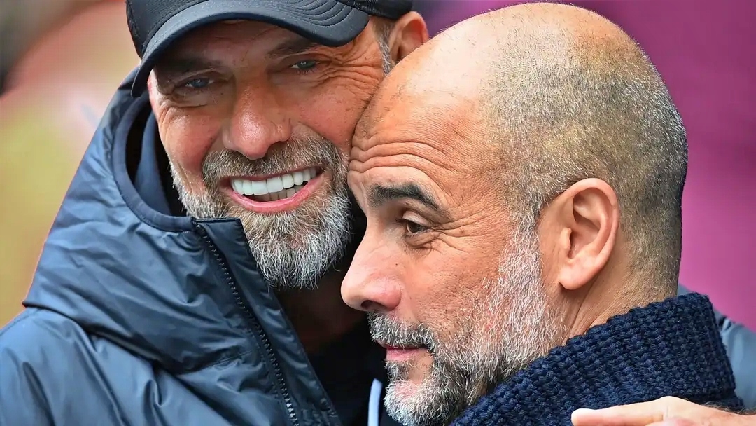 HLV Pep Guardiola gửi lời cảm ơn tới HLV Klopp (Ảnh: Getty).