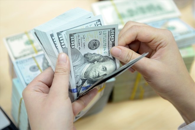 Đà tăng của tỷ giá VND/USD đã bớt “nóng” (Ảnh minh họa: KT)