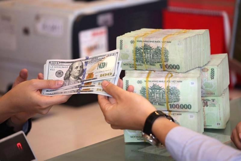 Tỷ giá vẫn là một rủi ro cần lưu ý của thị trường chứng khoán (Ảnh minh họa: KT)