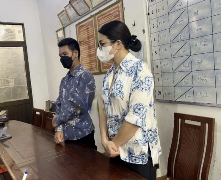 Phan Hoàng Bích Tiên và Nguyễn Đình Kỳ tại cơ quan điều tra.