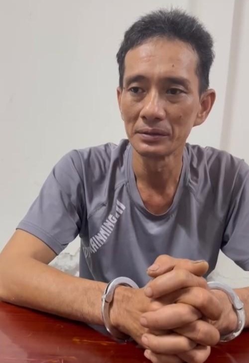 Đỗ Thái Em tại cơ quan công an.