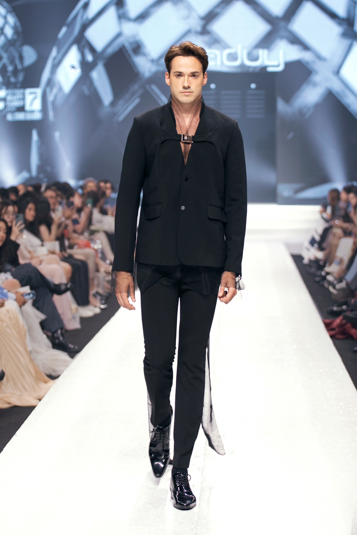 Mister World 2019 Jack Helsewood models an outfit created by local designer Ha Duy.